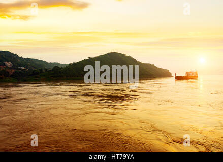 The early morning of the Yangtze River, barges filled with cars. Stock Photo