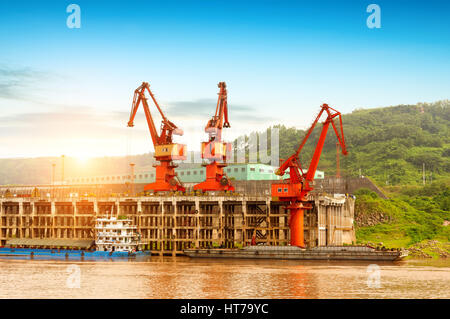 China Yangtze River docks and cranes. Stock Photo