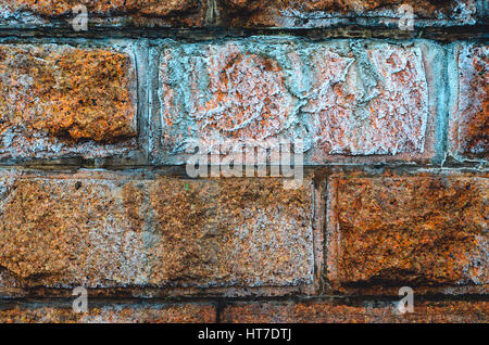 Frozen granite wall background. Laying of granite stone Stock Photo
