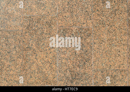 Red granite wall as a texture background Stock Photo