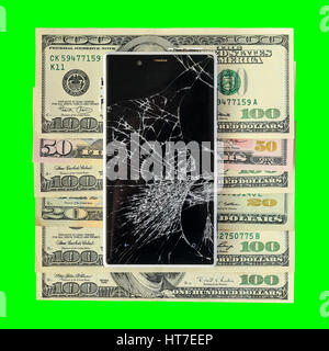 Smartphone with broken display lying on money banknotes Isolated on green chroma key background. Need new smartphone concept Stock Photo