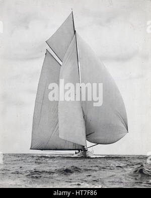 Antique c1900 photograph, unknown yacht belonging to Charles Oliver Iselin. Iselin (1854-1932) was an American banker and yachtsman. He participated in and won six consecutive America’s Cup races in 1887, 1893, 1895, 1899, 1901 and 1903. He owned yachts 'Defender,' 'Reliance,' 'Columbia' and others. Photograph by Winslow of Providence, Rhode Island. SOURCE: ORIGINAL SILVER GELATIN PRINT. Stock Photo