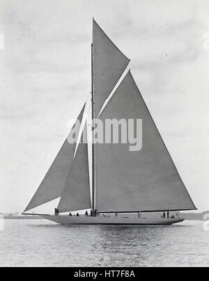 Antique c1900 photograph, unknown yacht belonging to Charles Oliver Iselin. Iselin (1854-1932) was an American banker and yachtsman. He participated in and won six consecutive America’s Cup races in 1887, 1893, 1895, 1899, 1901 and 1903. He owned yachts 'Defender,' 'Reliance,' 'Columbia' and others. Photograph by Winslow of Providence, Rhode Island. SOURCE: ORIGINAL SILVER GELATIN PRINT. Stock Photo