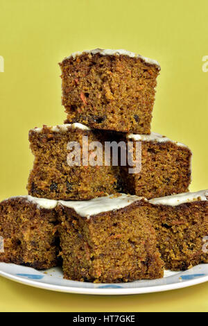 Home made carrot cake piled on plate Stock Photo