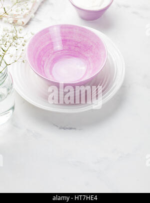 Breakfast setting table blurred background. Stock Photo