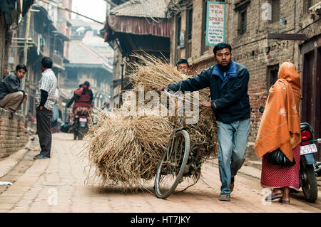 An Early Morning Street Scene In Bhaktapur, Kathmandu, Nepal Stock Photo