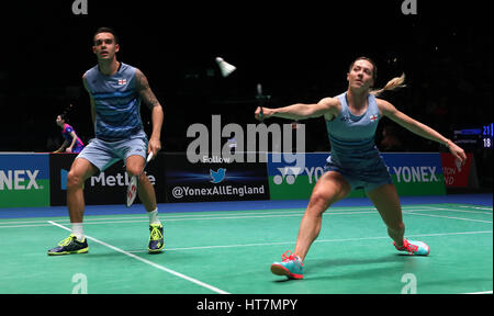 England's Chris Adcock (left) and Gabrielle Adcock in action during the Mixed doubles match during day two of the YONEX All England Open Badminton Championships at the Barclaycard Arena, Birmingham. Stock Photo