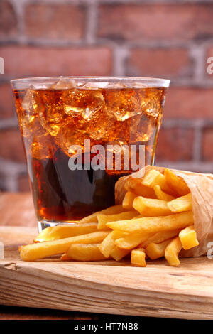 French fries and coke with ice Stock Photo
