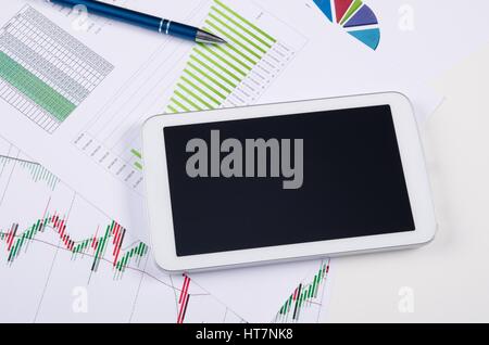 Digital tablet on business documents. Work in office composition Stock Photo