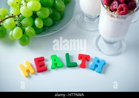 Health word made up of letters with magnets. Composition of healthy food Stock Photo
