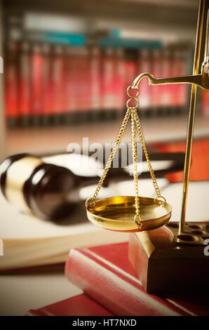 Scale of Justice. Law composition with gavel on books in background Stock Photo