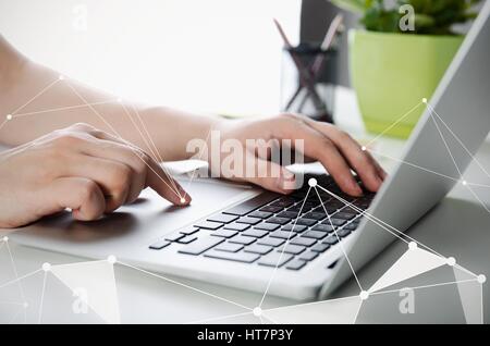 Man working with modern laptop in office. Hands typing on keyboard Stock Photo