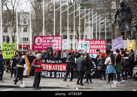 London, UK. 8th March, 2017. Women from Global Women's Strike and Women's Strike UK protest in Parliament Square on International Women's Day and as part of an International Women's Strike. Women from the All African Women’s Group performed a short play about sexism and racism in the immigration system. Credit: Mark Kerrison/Alamy Live News Stock Photo