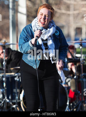 Columbus, USA. 08th Mar, 2017. Rachel Reiser of the International Socialist Organization addresses the Columbus crowd at the 'A Day Without a Woman' Rally. Columbus, Ohio, USA. Credit: Brent Clark/Alamy Live News Stock Photo
