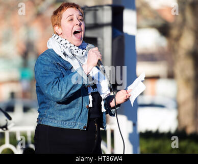 Columbus, USA. 08th Mar, 2017. Rachel Reiser of the International Socialist Organization addresses the Columbus crowd at the 'A Day Without a Woman' Rally. Columbus, Ohio, USA. Credit: Brent Clark/Alamy Live News Stock Photo