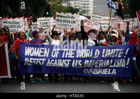 Manila, Philippines. 08th Mar, 2017. Women rights group Gabriela, lead a march to the U.S. embassy in Manila, noon Wednesday in observation of International Women's Day. Credit: J Gerard Seguia/Pacific Press/Alamy Live News Stock Photo