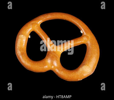 closeup of a lye pretzel in dark back Stock Photo