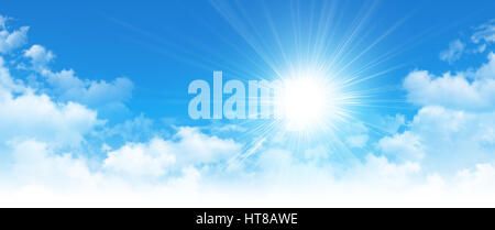 Early morning blue sky, shining sun rising up and breaking through white clouds Stock Photo