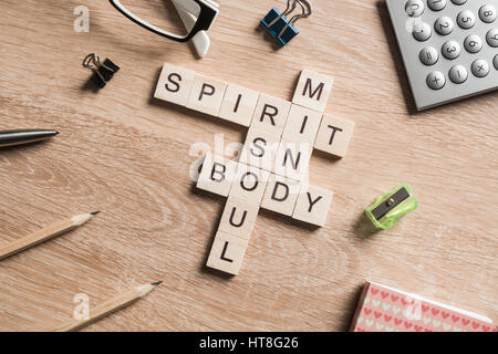 Spirit soul mind and body words made of wooden cubes Stock Photo