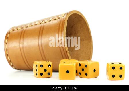 dice cup with five dices on white background Stock Photo