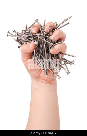 Man's hand holding metal nails. Closeup with clipping path isolated on white background Stock Photo