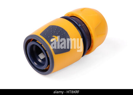 Orange garden water hose nozzle and connectors isolated on white background with soft shadow. Photo with clipping path Stock Photo