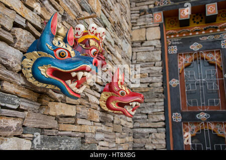 Bhutan, Thimphu, National Library of Bhutan (aka Druk Gyelyong Pedzo) Home to the country’s collection of historic texts. Traditional masks. Stock Photo