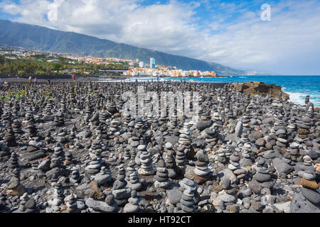 Stone Towers on Beach at Puerto de la Cruz, Tenerife, Canary Islands, Spain Stock Photo