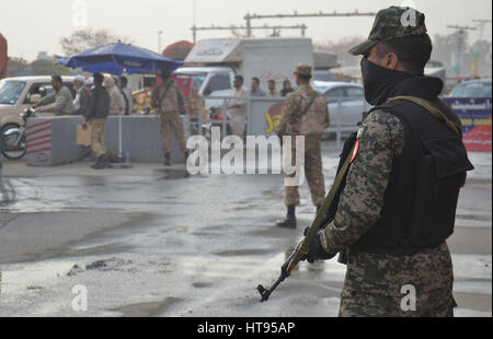 Lahore, Pakistan. 08th Mar, 2017. Pakistani Army, ranger and police personnel check the vehicles at the in and out points of the city after security alert over threats of terrorism in Lahore. Credit: Rana Sajid Hussain/Pacific Press/Alamy Live News Stock Photo