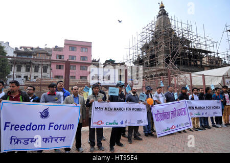 Kathmandu, Nepal. 08th Mar, 2017. Nepalese youth rally on a prade with the slogan 'Men March for Woman' during 107th International Women's Day Celebrates in Patan, Nepal on Wednesday, March 08, 2017. Credit: Narayan Maharjan/Pacific Press/Alamy Live News Stock Photo