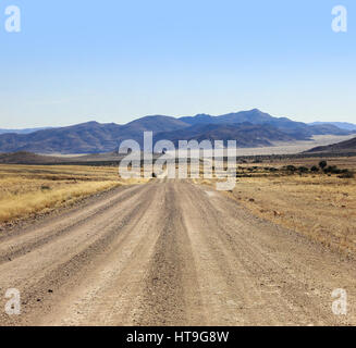 Bumpy road to success and through the african desert. Stock Photo