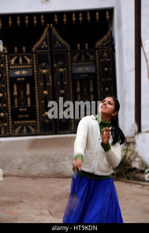 Girl playing a badmington. Khajuraho, India Stock Photo