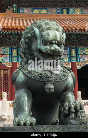 A bronze lion statue inside the Forbidden City in Beijing Stock Photo