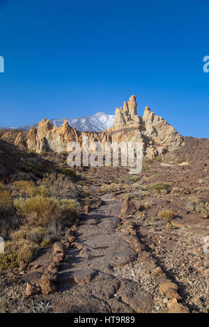 Looking towards El Teide Volcano on Tenerife with the Los Roques de Garcia in the foreground. Stock Photo