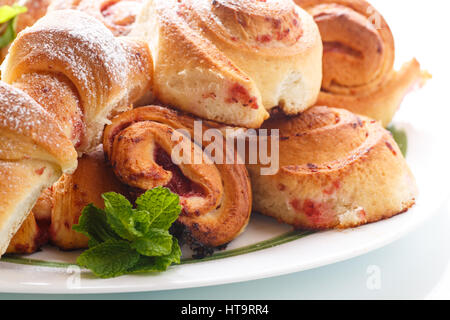 Sweet buns with jam on a white background Stock Photo