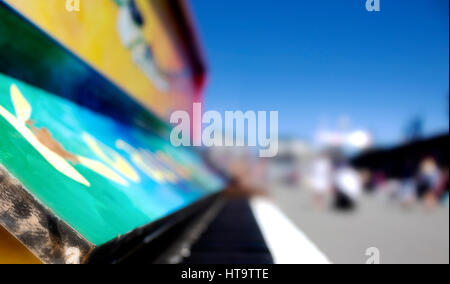 Profile view street piano, blurred background. Stock Photo