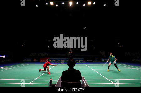 Hong Kong's Yip Pui Yin (left) and South Korea's Sung Ji Hyun in action during their Women's singles match during day three of the YONEX All England Open Badminton Championships at the Barclaycard Arena, Birmingham. Stock Photo