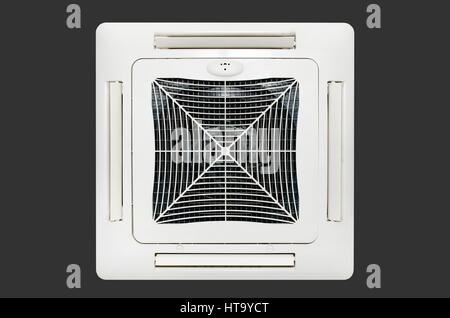 Air conditioning system installed on the ceiling. Isolated on dark gray background Stock Photo