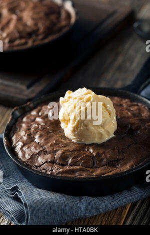 Homemade Sweet Dark Chocolate Brownie in a Skillet Ready to Eat Stock Photo