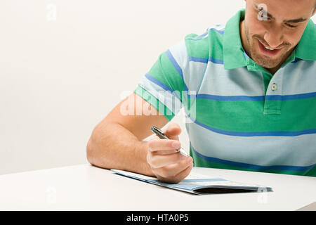 Man doing puzzle Stock Photo