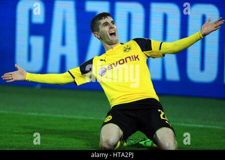 Dortmund, Germany. 8th Mar, 2017. Christian Pulisic of Borussia Dortmund celebrates scoring during the UEFA Champions League Round of 16 second leg match between Borussia Dortmund and SL Benfica at Signal Iduna Park in Dortmund, Germany, on March 8, 2017. Borussia Dortmund won 4-0 and advanced to the quarterfinal with 4-1 on aggregate. Credit: Luo Huanhuan/Xinhua/Alamy Live News Stock Photo
