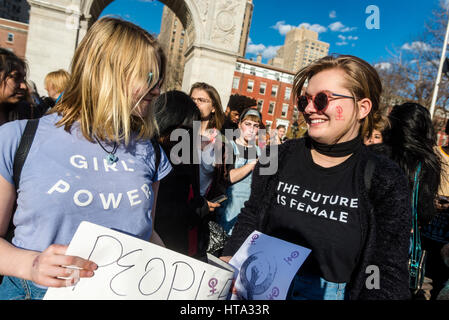 New York, USA. 8th Mar, 2017. Women marked International Women's Day - A Day Without a Woman, with a rally in Washington Square Park followed by a march. Many women wore red and took the day off as a general strike. Credit: Stacy Walsh Rosenstock/Alamy Live News Stock Photo
