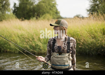 Idaho, USA. 7th Aug, 2016. Courtney Conklin and Jed Conklin flyfish for trout on the North Fork of the Coeur d'Alene River in North Idaho on a summer evening. Credit: Credit: /ZUMA Wire/Alamy Live News Stock Photo