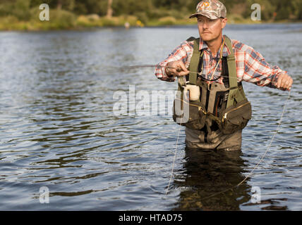 Idaho, USA. 7th Aug, 2016. Courtney Conklin and Jed Conklin flyfish for trout on the North Fork of the Coeur d'Alene River in North Idaho on a summer evening. Credit: Credit: /ZUMA Wire/Alamy Live News Stock Photo