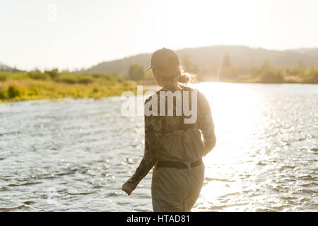 Idaho, USA. 7th Aug, 2016. Courtney Conklin and Jed Conklin flyfish for trout on the North Fork of the Coeur d'Alene River in North Idaho on a summer evening. Credit: Credit: /ZUMA Wire/Alamy Live News Stock Photo