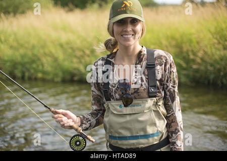 Idaho, USA. 7th Aug, 2016. Courtney Conklin and Jed Conklin flyfish for trout on the North Fork of the Coeur d'Alene River in North Idaho on a summer evening. Credit: Credit: /ZUMA Wire/Alamy Live News Stock Photo