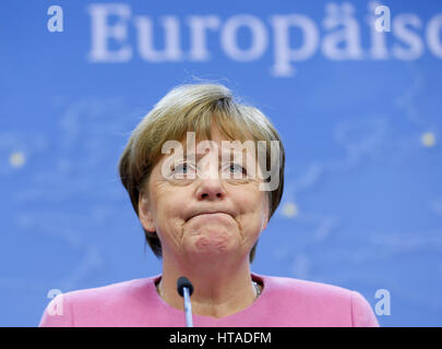 Brussels, Belgium. 9th Mar, 2017. German Chancellor Angela Merkel reacts during a press conference at the end of the first day of the EU spring summit in Brussels, Belgium, on March 9, 2017. The European Council kicked off its spring summit on Thursday afternoon. Credit: Ye Pingfan/Xinhua/Alamy Live News Stock Photo