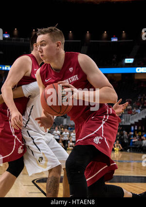 Washington State forward Josh Hawkinson (24) puts up a shot over ...