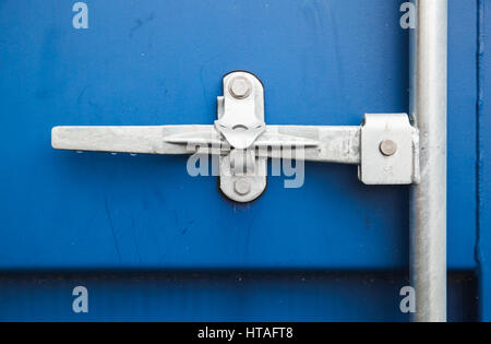 Gate valve of standard blue cargo shipping container Stock Photo