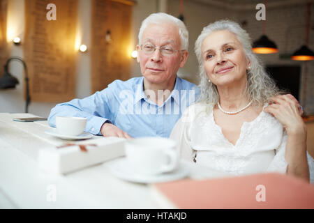 Senior husband and wife spending time in cafe Stock Photo